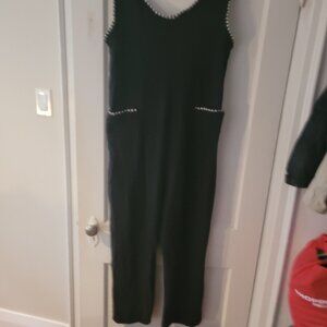 black stretchy overalls with a striped lining, size large-ish